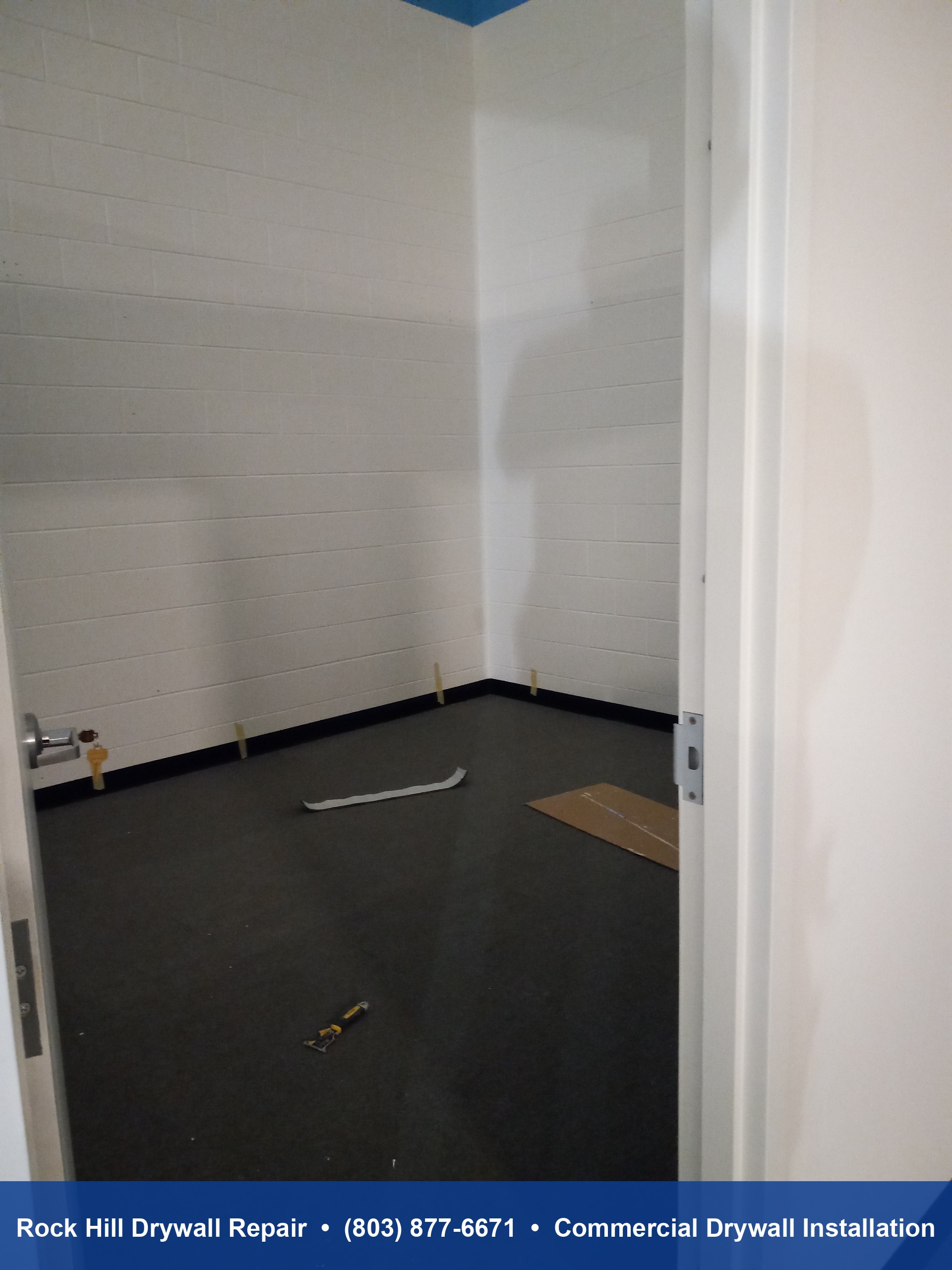 Completed commercial office buildout with drywall partition walls and doors in warehouse in Rock Hill SC