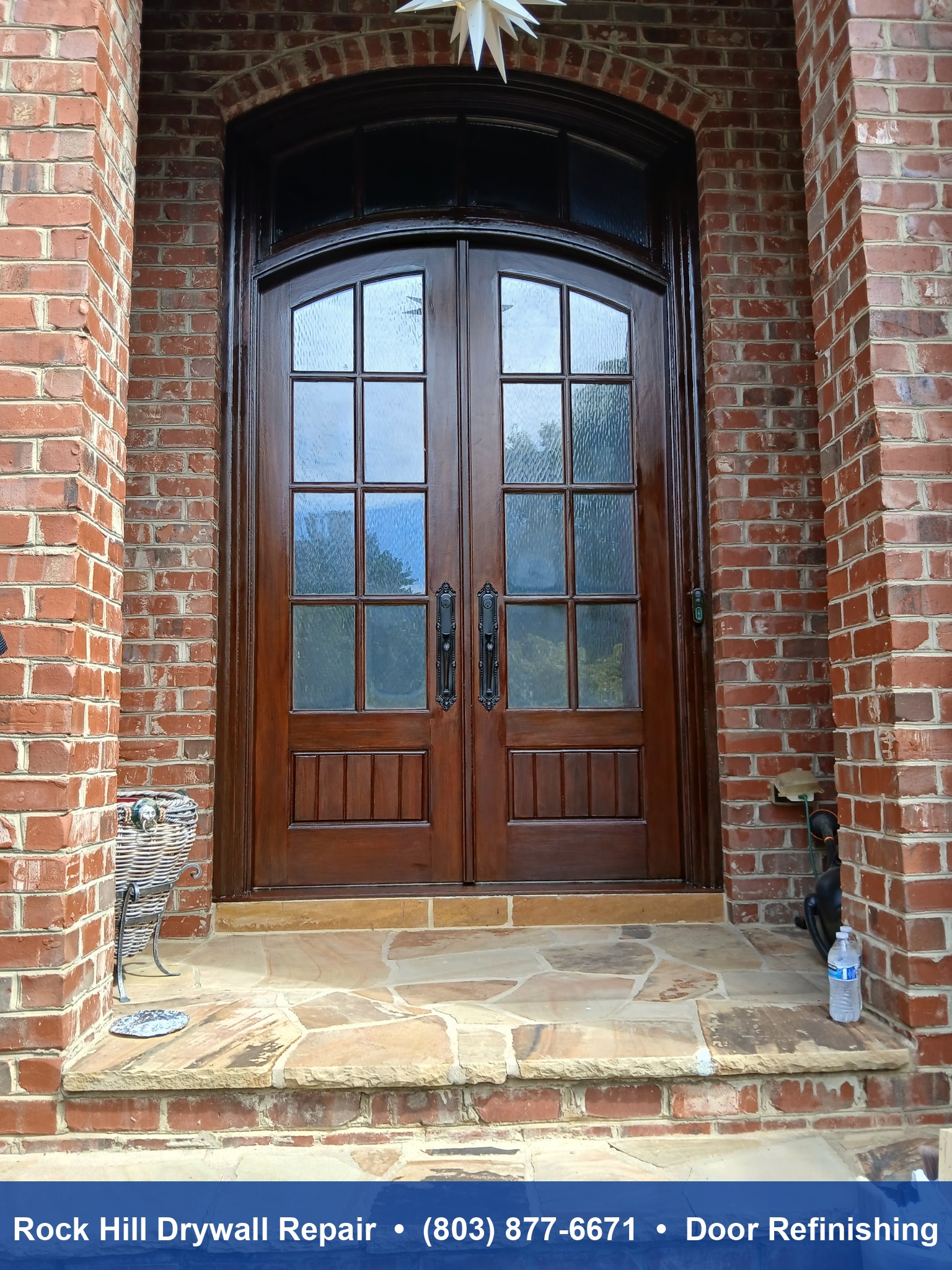 Beautiful arched double front door refinishing on brick home in Rock Hill SC