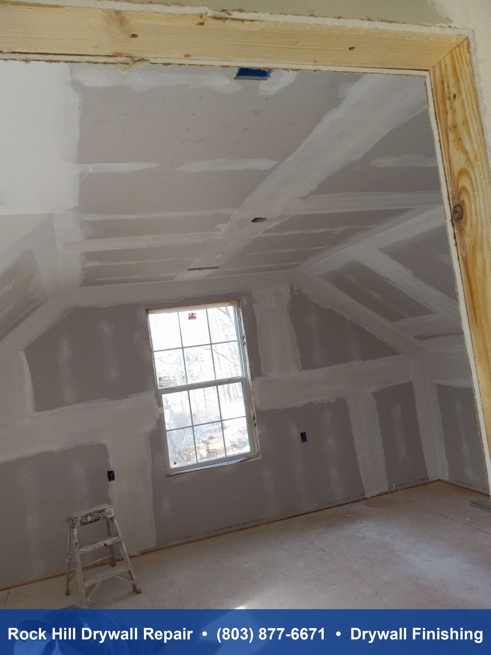 New construction drywall finishing with mud and tape on vaulted ceiling room in Rock Hill SC